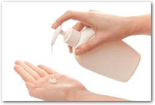 Liquid soap and woman's hands